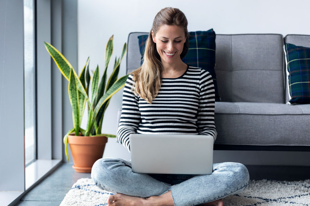 Female on laptop studying with CertPREP training labs